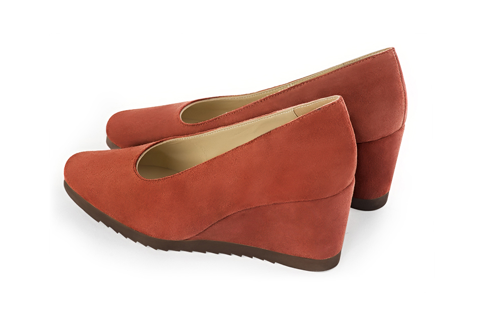 French elegance and refinement for these terracotta orange dress pumps, with a round neckline, 
                available in many subtle leather and colour combinations. This pretty wedge heel pump will be perfect for "everyday".
To be personalized with your materials and colors.   
                Matching clutches for parties, ceremonies and weddings.   
                You can customize these shoes to perfectly match your tastes or needs, and have a unique model.  
                Choice of leathers, colours, knots and heels. 
                Wide range of materials and shades carefully chosen.  
                Rich collection of flat, low, mid and high heels.  
                Small and large shoe sizes - Florence KOOIJMAN